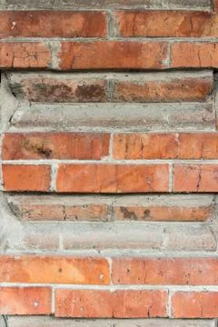 Background of old brickwork. Vertical frame. Stock Photos