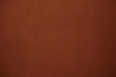 Background of old brown damaged paint on the wall. Stock Photos