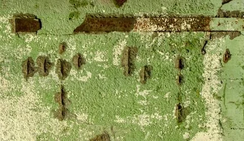 Background of an old concrete wall with rusty metal elements Stock Photos