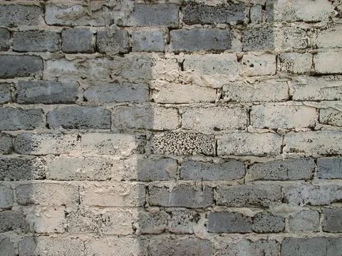 Background from old gray rough brick wall. Foto stock