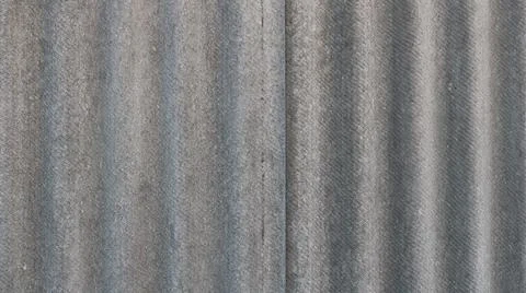 Background of old grey corrugated slate sheets Stock Photos