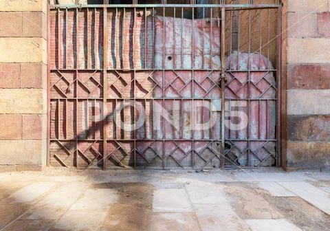 Background of old grunge antique wrought iron gate Stock Photos