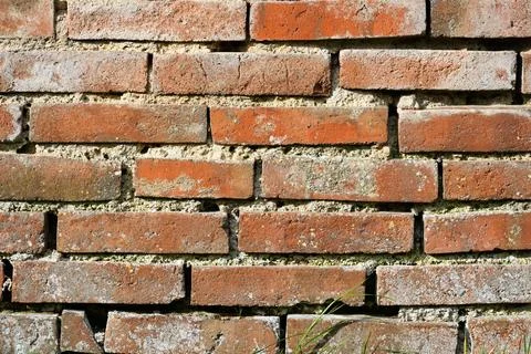 Background of an old orange bricks wall Stock Photos