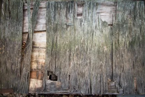 Background of old peeled cracked wood, stacked old boards Foto stock