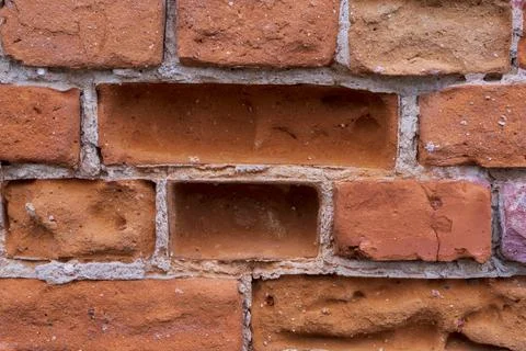 Background Old red brick crumbles. Stock Photos