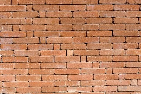 Background of old red brown bricks in horizontal display Stock Photos