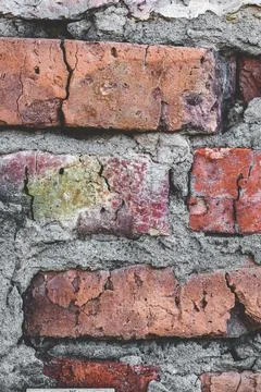 Background from old red dark bricks with cracks closeup Stock Photos