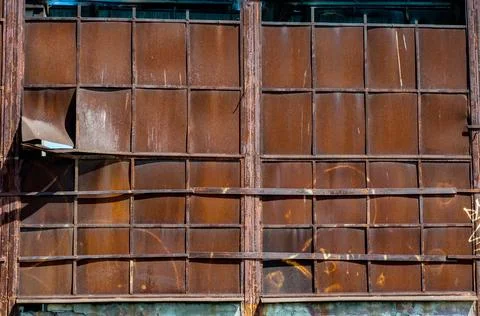 Background from old rusty metal sheets bonded to each other by argon welding Stock Photos