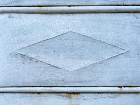 Background of an old rusty metal surface with rhombus shaped pattern on it Stock Photos