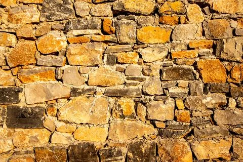 Background of old stone brick wall. Stock Photos