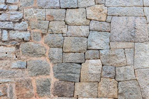 Background of old stone brick wall. Stock Photos