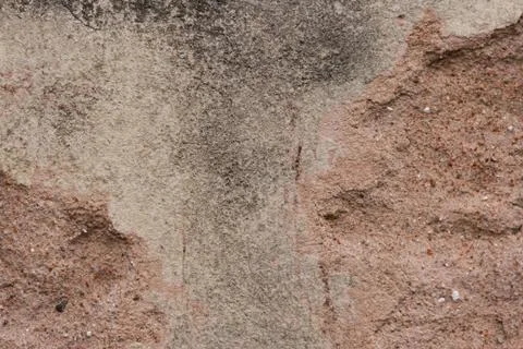 Background with old texture of broken cement wall in reddish color Stock Photos