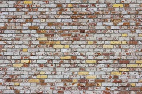 The background of an old textured brick wall. Stock Photos
