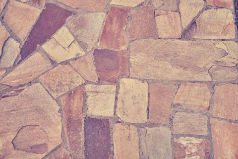 Background of old tiles of different shapes with dirt and scuffs Foto stock