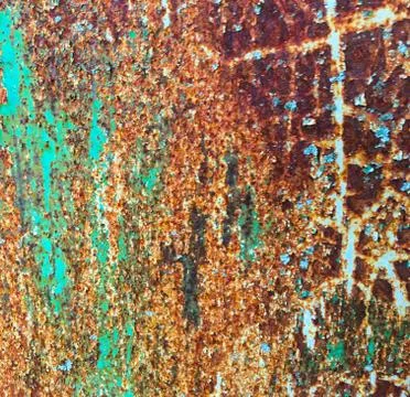Background of an old wall covered in blue and red paint. Rusty metal surface. Stock Photos