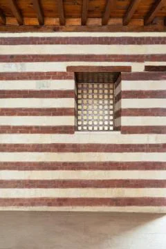 Background of old wall with red bricks and yellow stones Stock Photos