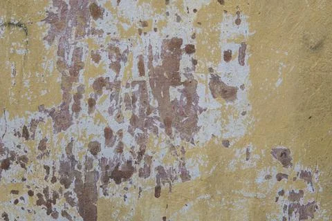 Background of old yellow painted wall with crack paint Stock Photos