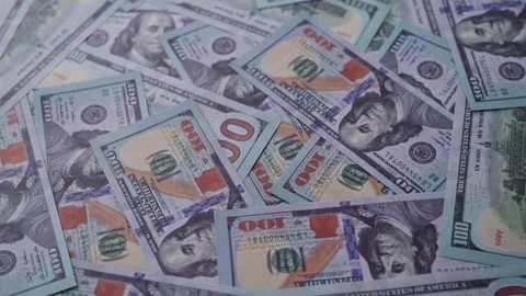 Background of one hundred US dollar bills scattered randomly. Stock Footage 338337128