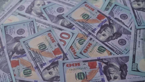 Background of one hundred US dollar bills scattered randomly. Stock Footage 338337141