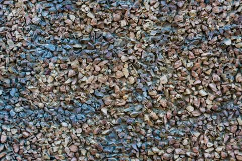 Background or backdrop of colored small pebbles. Texture of small stones. Stock Photos