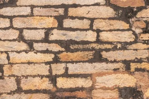 Background or Texture of ancient stone wall Stock Photos
