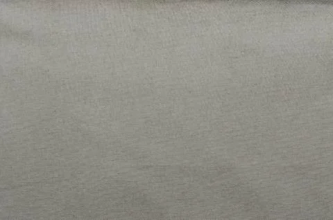 A background or texture of beige linen or cotton material Stock Photos