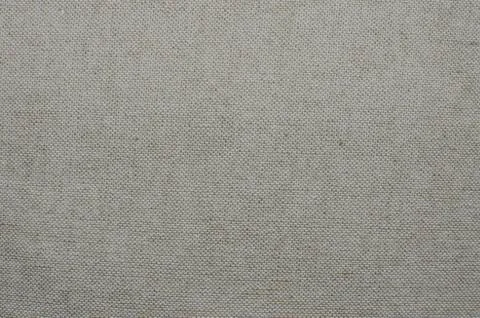 A background or texture of beige linen or cotton material Stock Photos