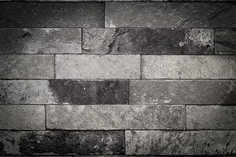 Background or texture in the form of a gray brick wall Stock Photos