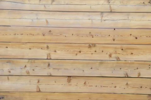 Background or texture of a light brown wooden wall. Natural wooden background Stock Photos