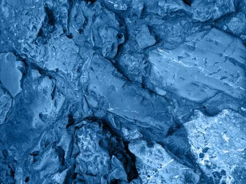 The background or texture of the rock. The surface of the stone. Stock Photos