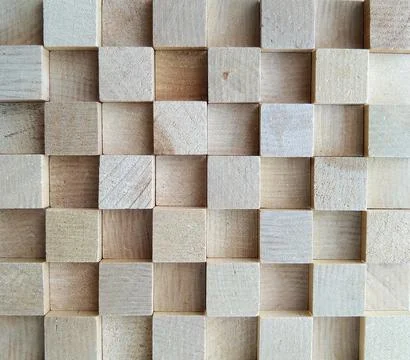 The background or wall is made of square wooden bars of the same size Stock Photos