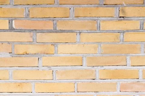 Background of orange brick wall pattern texture. Stock Photos