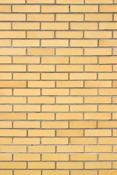 Background of orange brick wall texture. Stock Photos