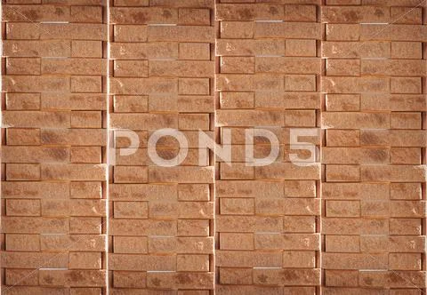 Background of orange brick wall texture Stock Photos