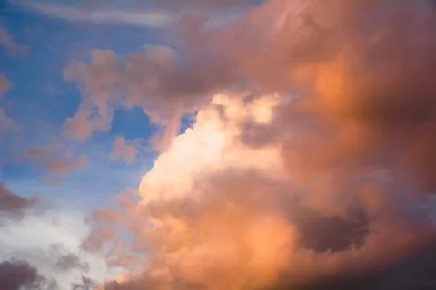 Background of orange sky concept, sunset with twilight color sky and clouds. Stock Photos