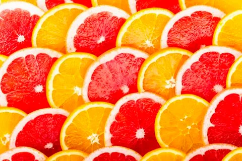 Background from the oranges and grapefruits Stock Photos