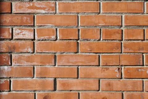Background of ordinary red brick wall. City background Stock Photos