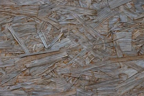 Background of oriented strand board that has faded Stock Photos