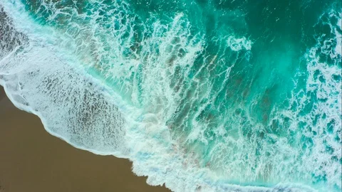 Background overhead turquoise waves crashing on beach Stock Footage 106636435