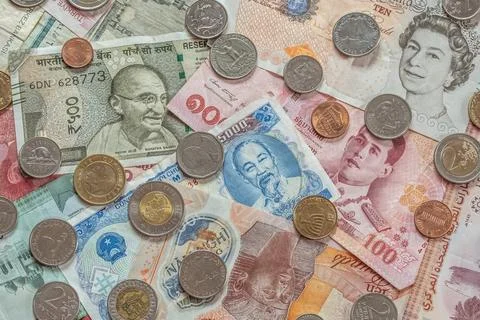 Background from paper money of the different countries. Various World Curre.. Stock Photos