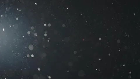 Background of particles wave in air over black background and lens flare Stock Photos