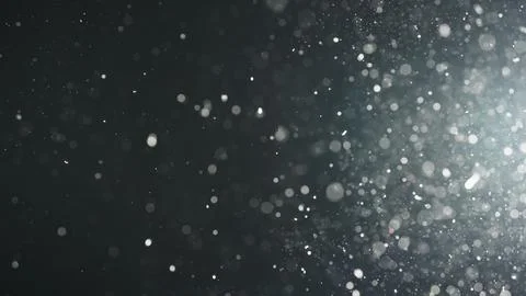Background of particles wave in air over black background and lens flare Stock Photos