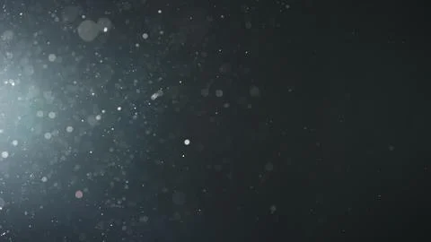 Background of particles wave in air over black background and lens flare Stock Photos