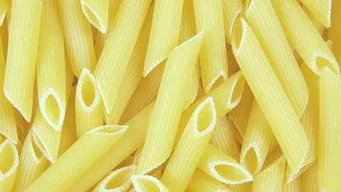 Background pasta rotate clockwise top view Stock-Footage 99858426