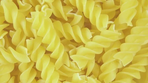 Background pasta rotate clockwise top view Stock-Footage 99858625