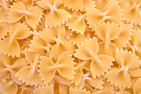 Background of paste in the form of bows. Stock Photos