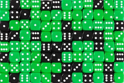 Background patteren of random ordered green and black dices Stock Photos