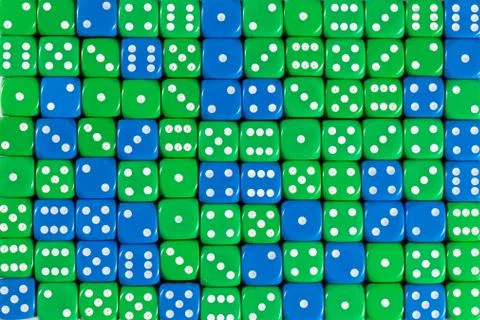 Background patteren of random ordered green and blue dices Stock Photos