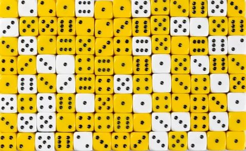 Background patteren of random ordered yellow and white dices Stock Photos