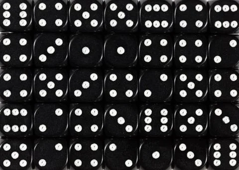 Background pattern of black dices, random ordered Stock Photos